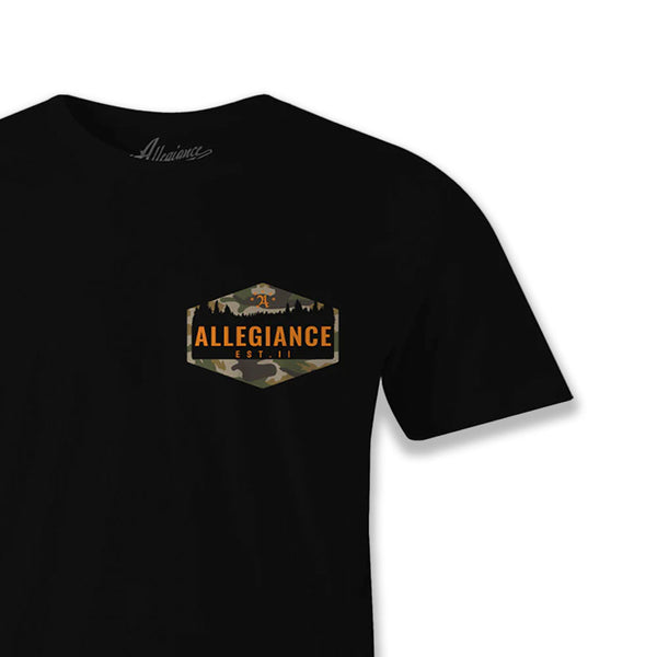 Close-up of Hunter Tee front chest graphic showing detailed hexagon with forest silhouette and “Allegiance” branding.
