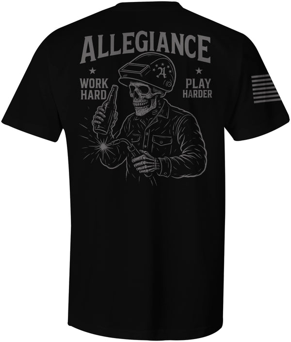 Back of Black Allegiance Play Harder Tee showing large skeleton welder artwork with the phrase Work Hard Play Harder and bold Allegiance text, with an American flag sleeve print.